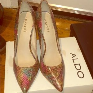 Multi colored snake skin shoes.